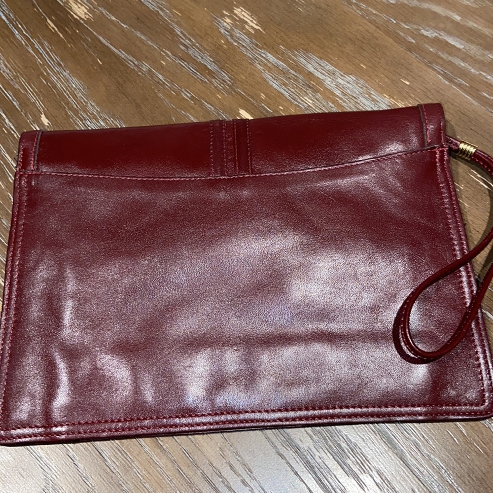 Philippe Oversized wristlet. Chocolate color with red under tone. - Picture 2 of 13